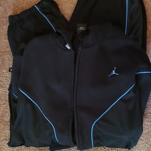 Melo Jordan jogging suit. Black with the baby blue pin stripe. Siz Large,